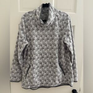 Fleece top. Mock neck and high low hem.